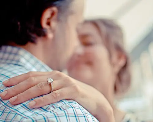 couple smiling and embracing