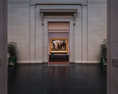 A painting hanging in a gallery.