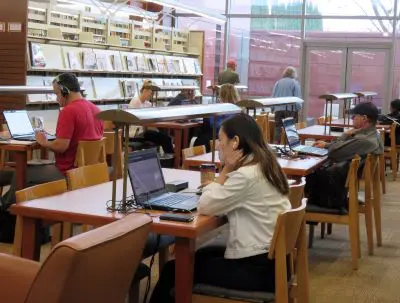 people sitting in a library