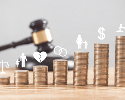 Judge gavel, coins and divorce symbols on the desk